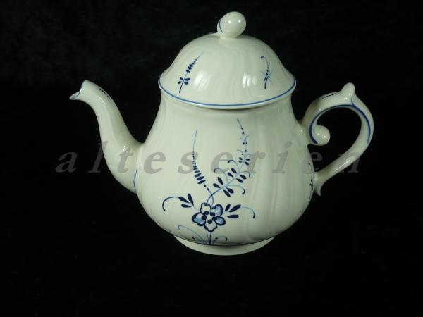 Teekanne mit blauem Streifen am Knauf