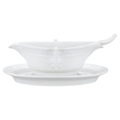 Sauciere mit Teller und Löffel