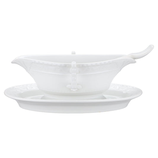 Sauciere mit Teller und Löffel