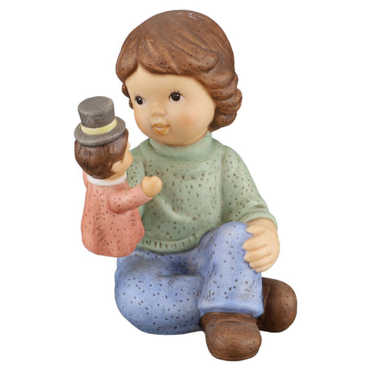 Junge mit Handpuppe