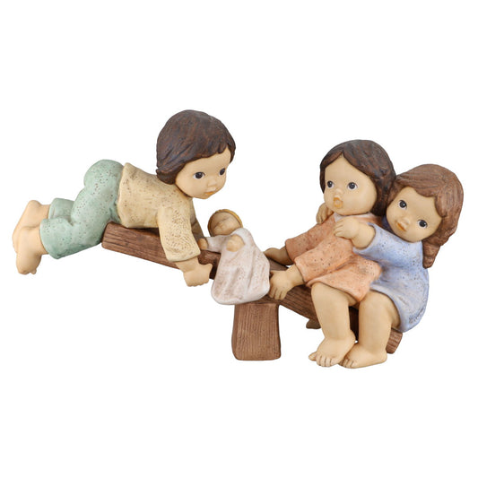 Kinder auf Wippe