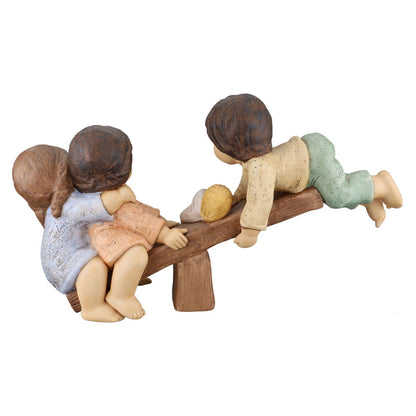 Kinder auf Wippe