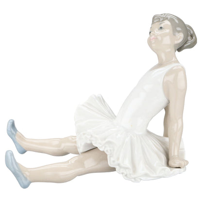 Figur Kleine Ballerina Elevin sitzend