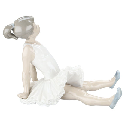 Figur Kleine Ballerina Elevin sitzend